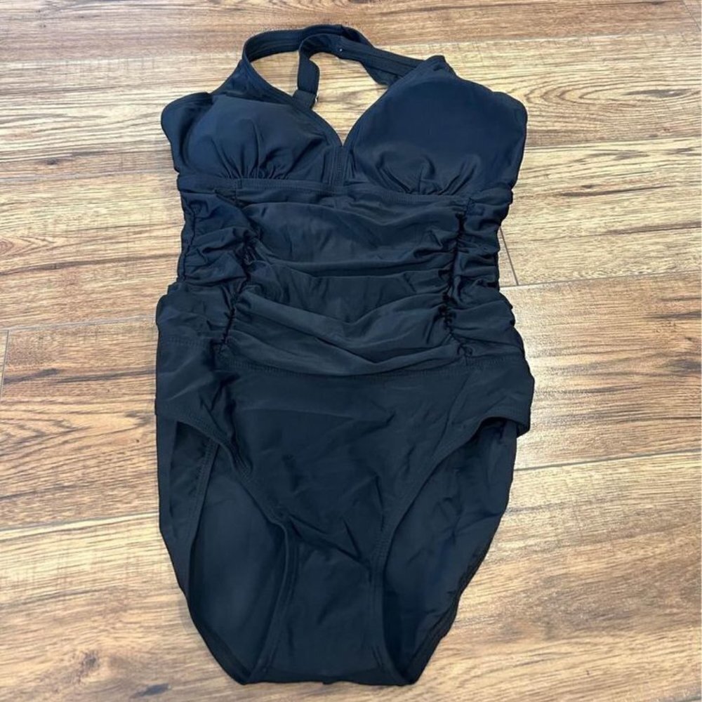 Woman’s one piece swimsuit. Rouching and adjustable strap. Blackest black. Brand